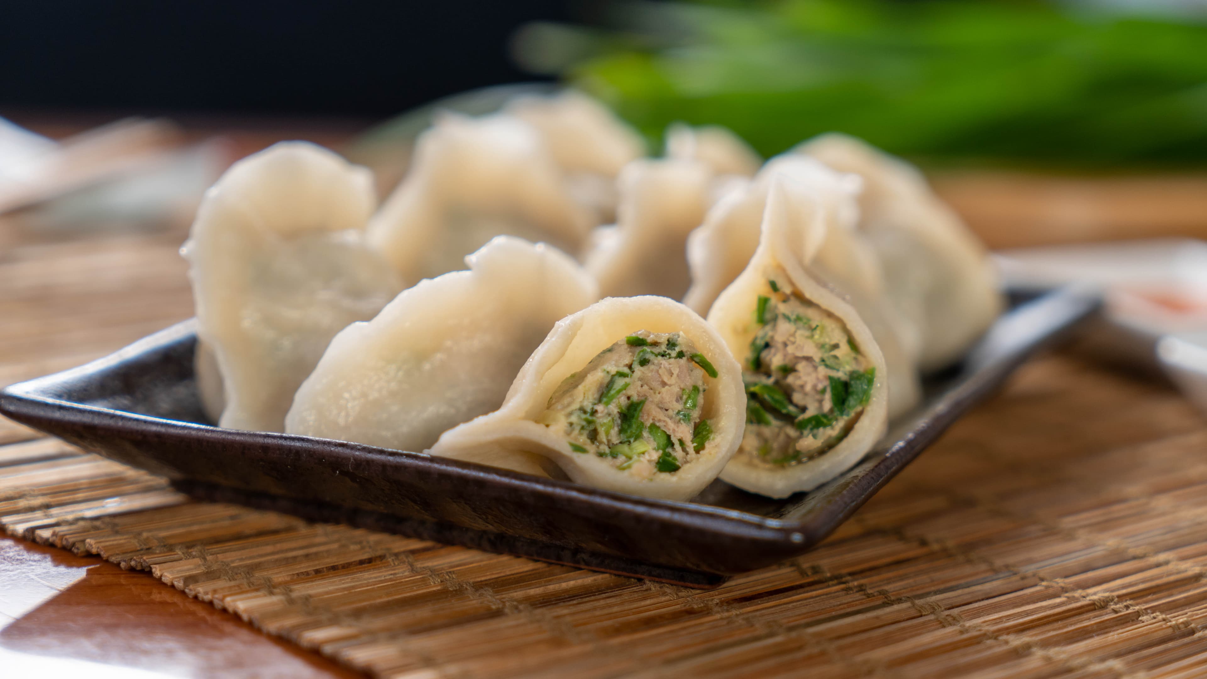 Pork & Cilantro Dumpling - Juicy pork dumplings filled with savory cilantro, providing a rich and earthy fl | Dumpling