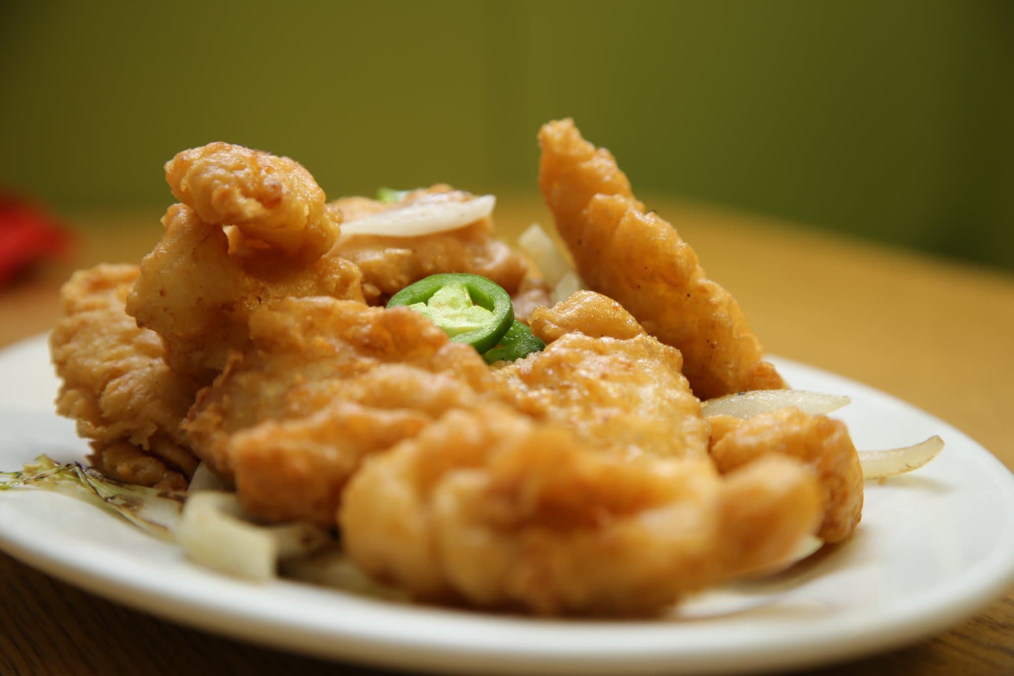 Salt & Pepper Fish - Tender battered fish fillets seasoned with a flavorful blend of salt, pepper, an | Seafood